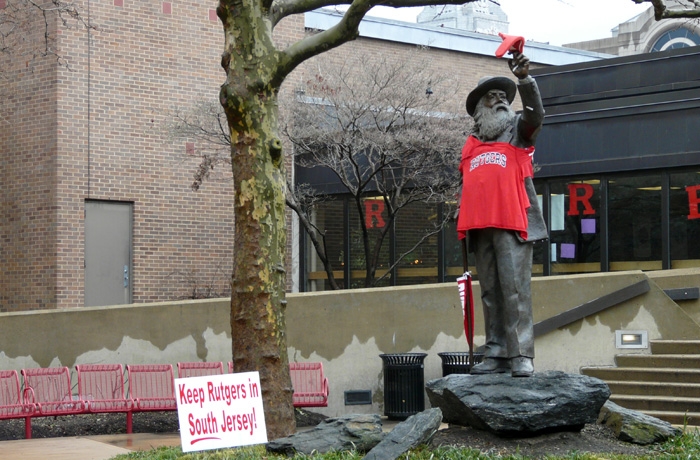 Walt Whitman statue at Rutgers–Camden adorned with Rutgers garb