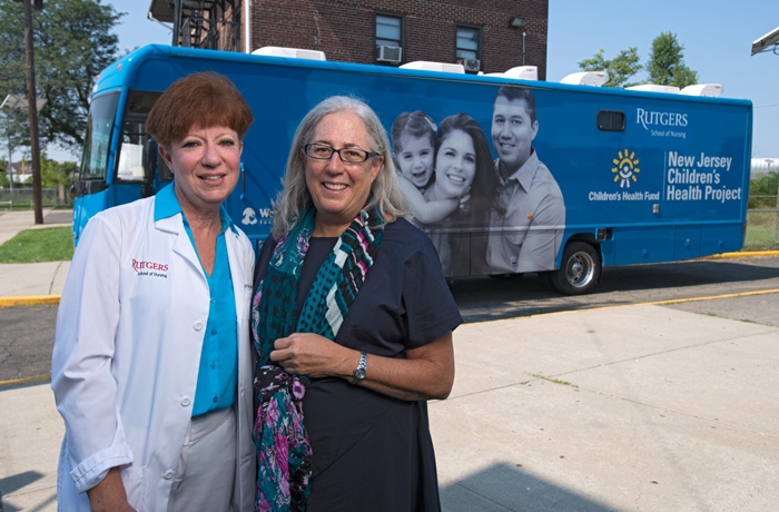 Cindy Sickora and Sue Willard outside the New Jersey Children's Health Project mobile van